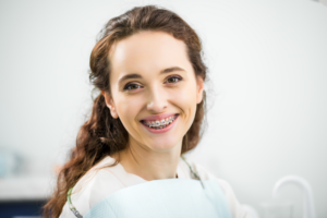 a patient with braces visiting their orthodontist